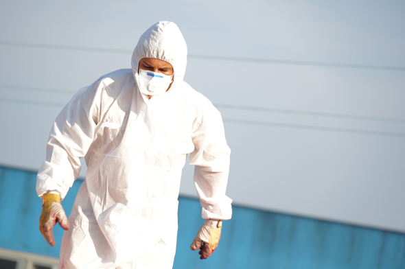 Asbestos - person in protective clothing